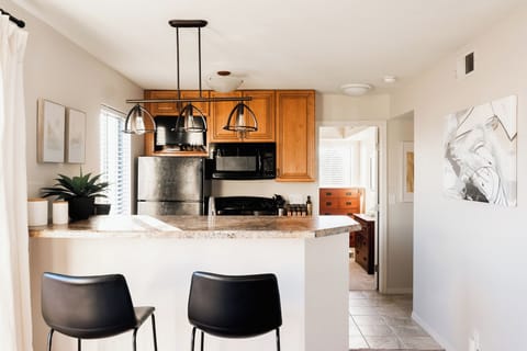 Open kitchen and bar seating