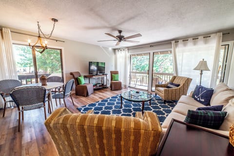 Living area with corner views of the fairway on course #5