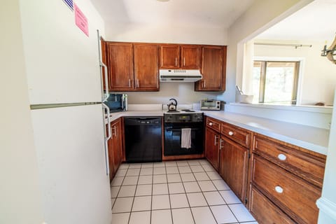 Kitchen with new oven and stove, and keurig coffee maker