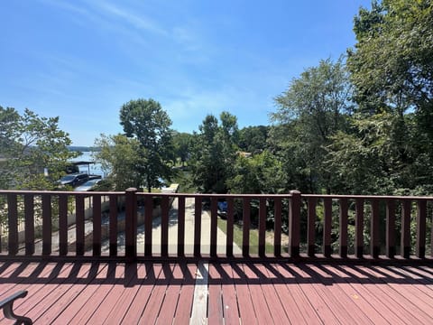 Balcony off Master Bedroom. View of Boat ramp, dock, and lake.  