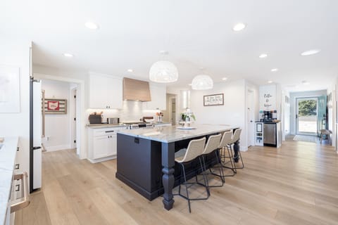 The large kitchen island can seat an additional 6 guests.

