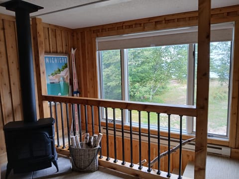 Stairs to upstairs loft bedroom and sitting area (with great views of the lake)
