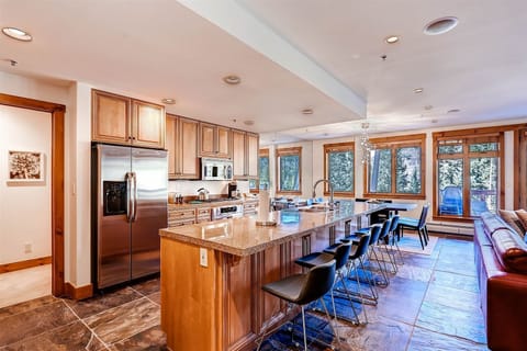 Upscale kitchen with breakfast bar