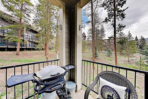 Patio provides serene natural views of the forested landscape