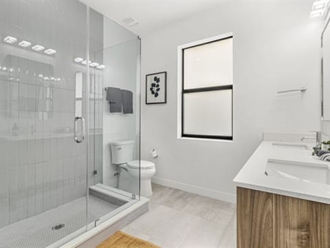 Master bathroom with walk in shower. 