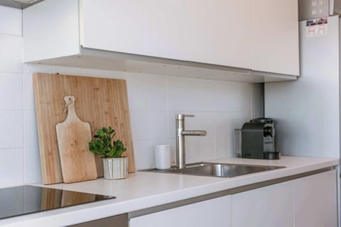 Separate kitchen with all modern amenities and direct access to terrace