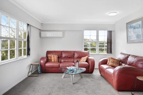 The living room has an air-conditioning unit that keeps it cool in summer and warm in winter.