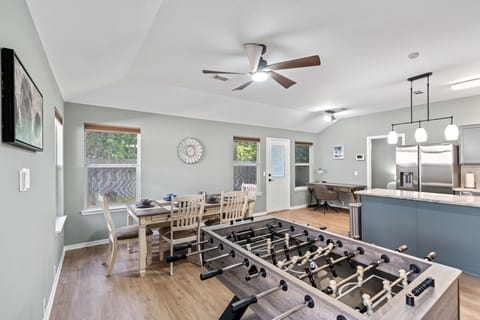 Open living space with plush seating and smart TV — perfect for movie nights.