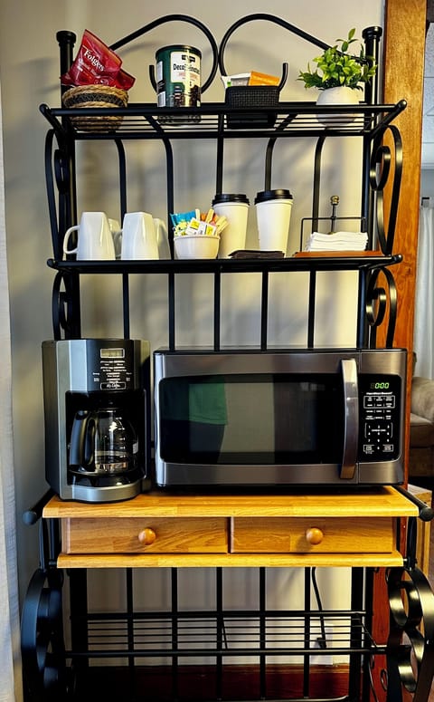 Dining Room-Baker's Rack with Microwave, Coffee Pot, Coffee, Tea & Hot Chocolate