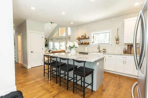 The spacious airy kitchen is full of natural light.