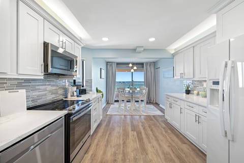 Sleek and spacious kitchen with updated appliances.