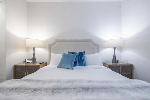 Spacious bedroom with ambient lighting