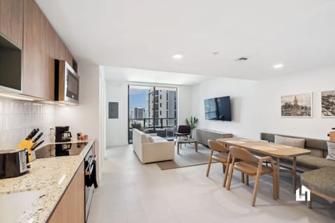 Take the elevator to the 24th floor and step into a haven of comfort and style.