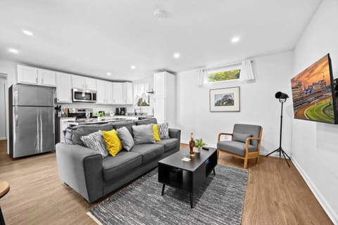 Living Room: Enjoy modern comforts in the eco-friendly ambiance of our home (Unit #5)