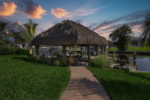 tiki hut at twilight 