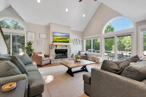 Large family room with view out to deck - access to the deck is located here