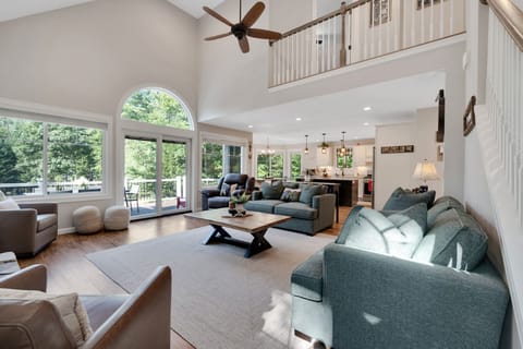 Movie nights are next level in this family room, there's plenty of room for everyone!