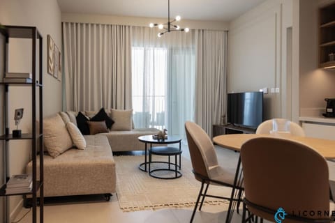 Enjoy modern entertainment in this chic living room, equipped with a smart TV for your viewing pleasure.