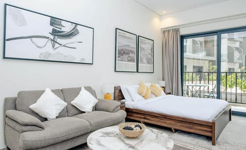 Relax in the plush bed or unwind on the comfy sofa, with a TV positioned for easy viewing from both.