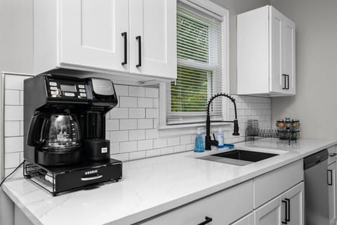 Lavish in nature views when dining or doing dishes with the touchless hands-free faucet and drying rack