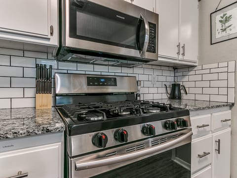 Gas stove and oven with microwave and kettle