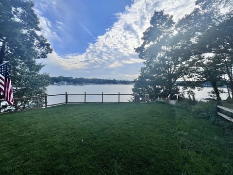 Charming lake front home on all-sports Little Crooked Lake in Sister Lakes Michi