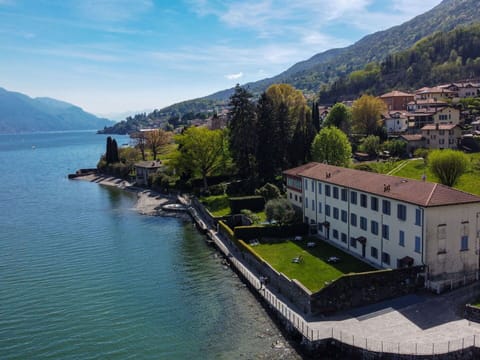 Sky, Property, Furniture, Table, Azure, Chair, Building, Window, Shade, Architecture