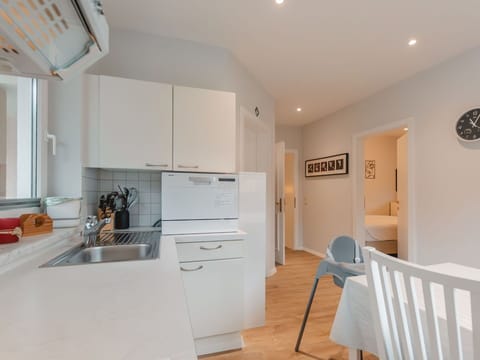 Cabinetry, Countertop, Furniture, Kitchen Stove, Building, Kitchen Appliance, Wood, Chair, Sink, Interior Design