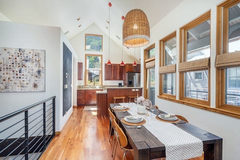 This multi-level, family-friendly condominium boasts an open living and kitchen area, abundant natural light, and stunning views of the ski mountain and surrounding landscape.
