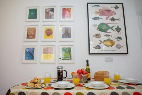 Kitchen table laid for breakfast