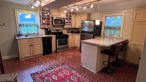 Large, open and fully stocked kitchen