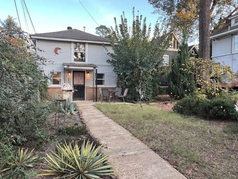 The carriage house is in the large back yard of our home w it's own gated entry.