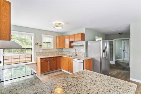 Full Kitchen with view of Laundry room on right.