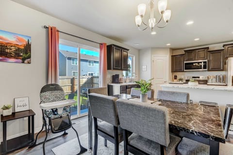 Enjoy meals together in the elegant dining area, with easy access to the backyard for al fresco dining.