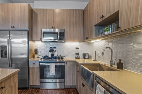 You can almost hear the sizzle of ingredients as you cook in the well-equipped kitchen, where every detail is designed for convenience.