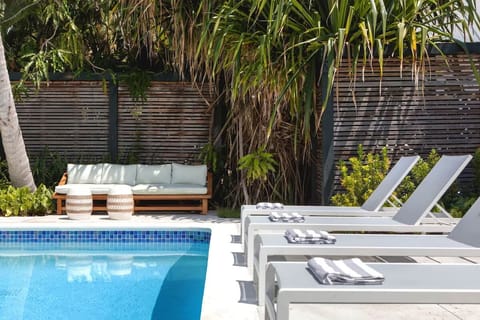 Stretch out poolside and savor quiet shade between swims.