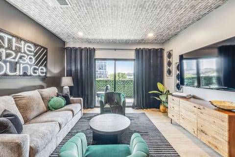 Living Room with Smart TV and patio access plus pull out queen sized sofa bed