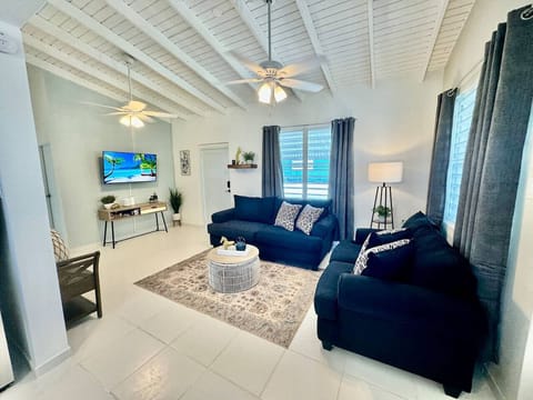 Bright, air-conditioned living space with room for the group to relax together.