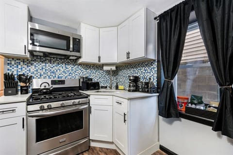 full kitchen - gas stove, 2 coffee makers, all cooking essentials, baby chair. full fridge, 4 person dining area, baby highchair