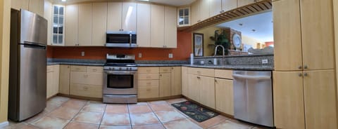 The kitchen is large and well appointed.