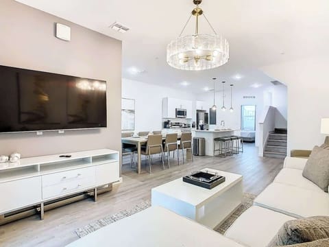 Cozy up in the spacious living area, perfect for unwinding with loved ones.