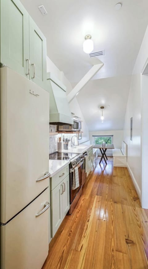 Bright kitchen with skylights and modern appliances