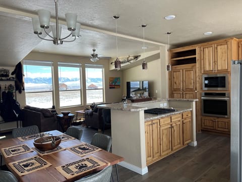 Kitchen and Family and view of mountains