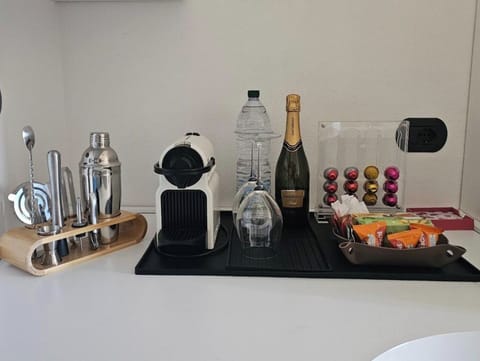 Wine, Coffee, Tea, and water (Complimentary)