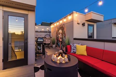 Relax on the rooftop with a firepit and stunning views of Seattle's stadiums.