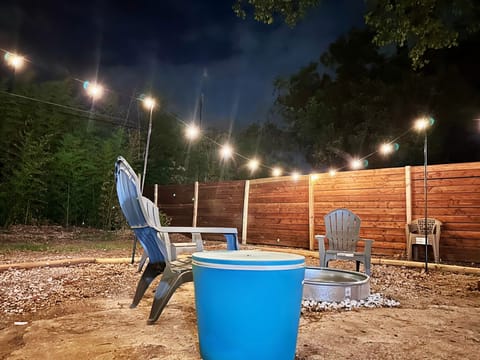 Fire pit & BBQ Smoker area in backyard