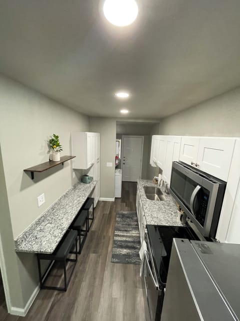 Kitchen with breakfast bar.