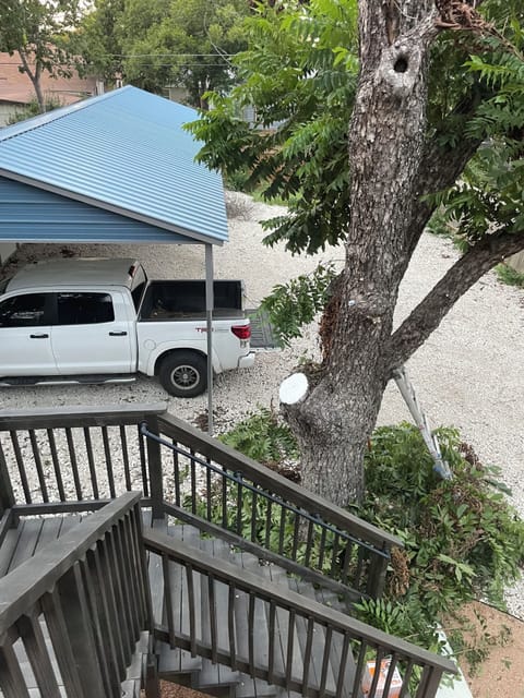 Covered parking close to rear entrance of unit.