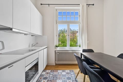 Open kitchen and dining area with modern amenities and plenty of space to enjoy home-cooked meals.