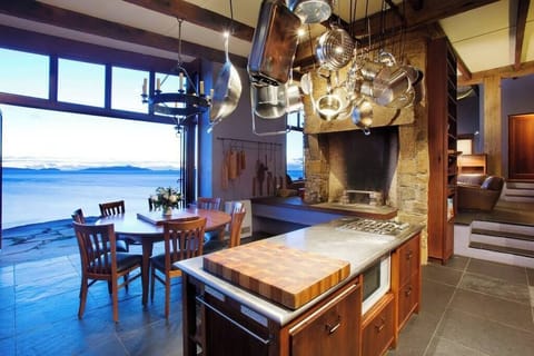 Our dining room and kitchen open out to the sea. 
